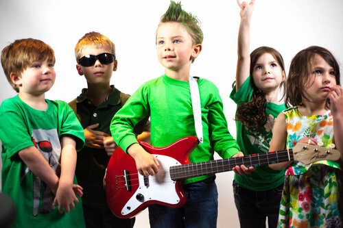 Children making music together in the Kids Rock Band imagery