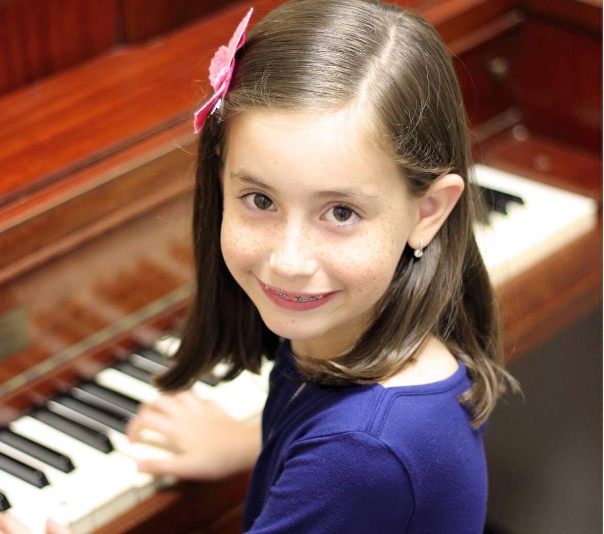 Young pianist at a piano, from the academy website